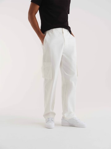 ABOUT YOU x Kevin Trapp Loose fit Cargo trousers 'Jaron' in White: front