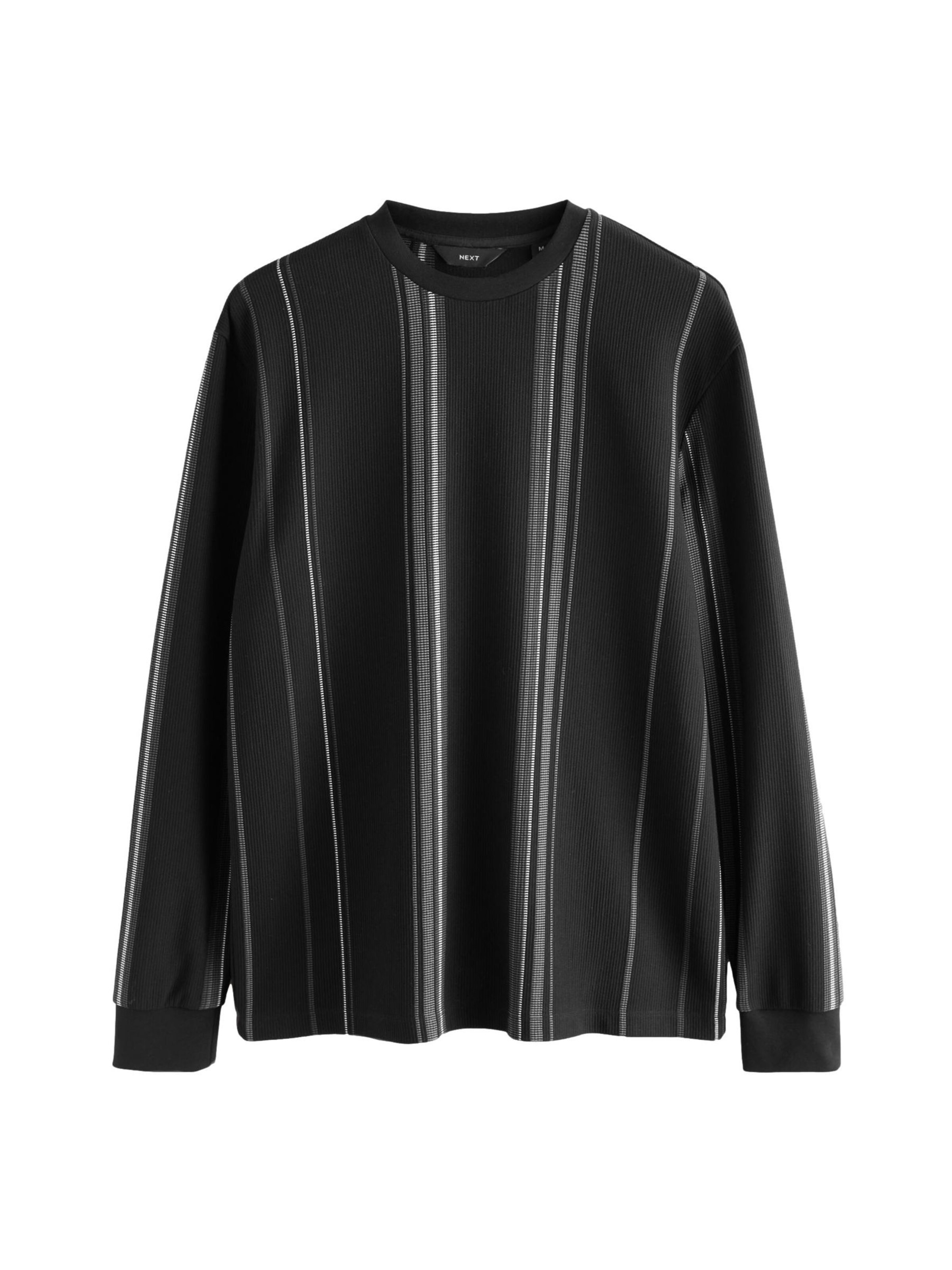 Next T-shirt i svart: framsida