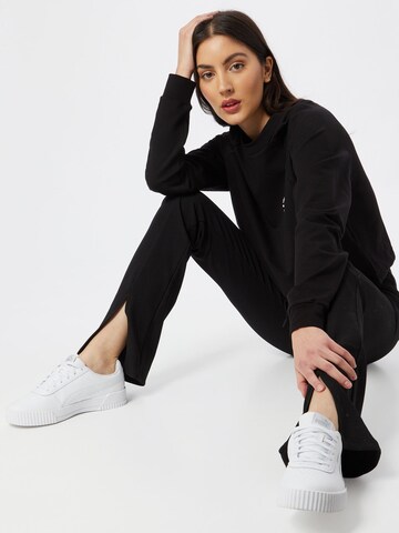 ABOUT YOU x GNTM Sweatshirt 'Xenia' in Black