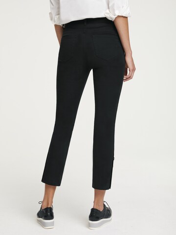 Skinny Pantaloni de la heine pe negru