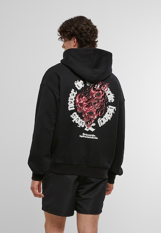 MJ Gonzales Sweatshirt 'Rebels never die' in Black: front