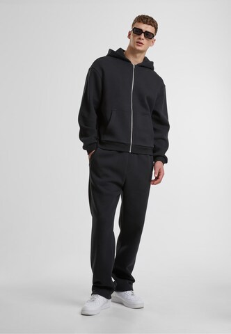 Urban Classics - Loosefit Pantalón en negro