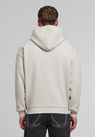 Veste de survêtement 'Essential' Karl Kani en beige
