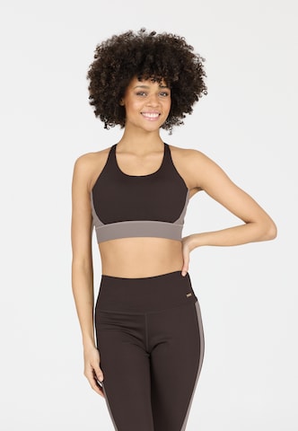 Athlecia Low Support Sport-BH 'Aspasia' in Braun: Vorderseite
