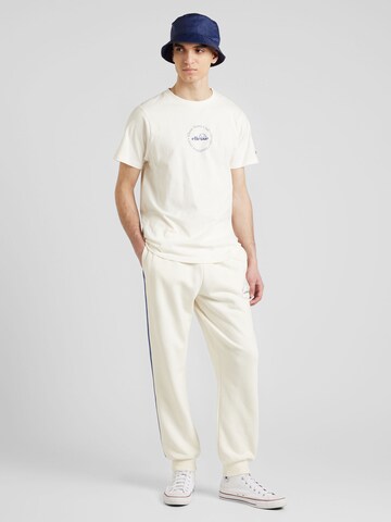 ELLESSE Tapered Pants 'Airla' in White