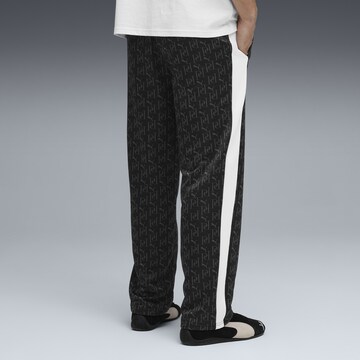 PUMA Loosefit Sportbroek 'T7' in Zwart