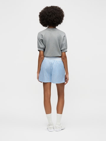 Largi Pantaloni de la Nike Sportswear pe albastru