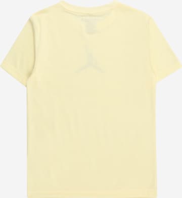 Jordan Koszulka funkcyjna w kolorze żółty