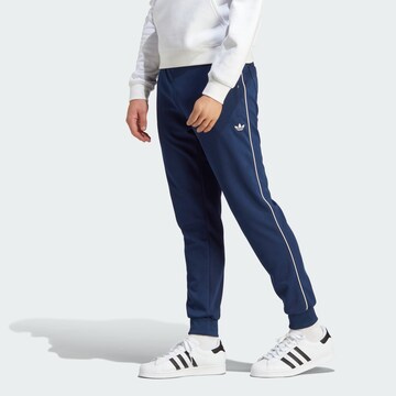 ADIDAS ORIGINALS Tapered Sportbroek 'Track' in Blauw: voorkant