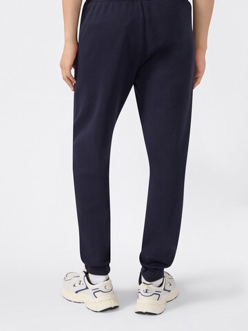 Champion Authentic Athletic Apparel Tapered Byxa i blå