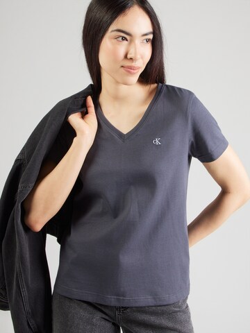 Tricou de la Calvin Klein Jeans pe albastru: față