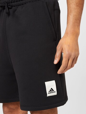 ADIDAS SPORTSWEAR Normalny krój Spodnie sportowe 'Lounge Fleece' w kolorze czarny