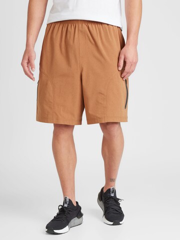 UNDER ARMOUR Loose fit Sports trousers 'Unstoppable' in Brown: front