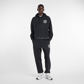 Regular Pantalon fonctionnel 'Reimagined' new balance en noir