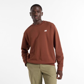 Sweat-shirt new balance en marron : devant