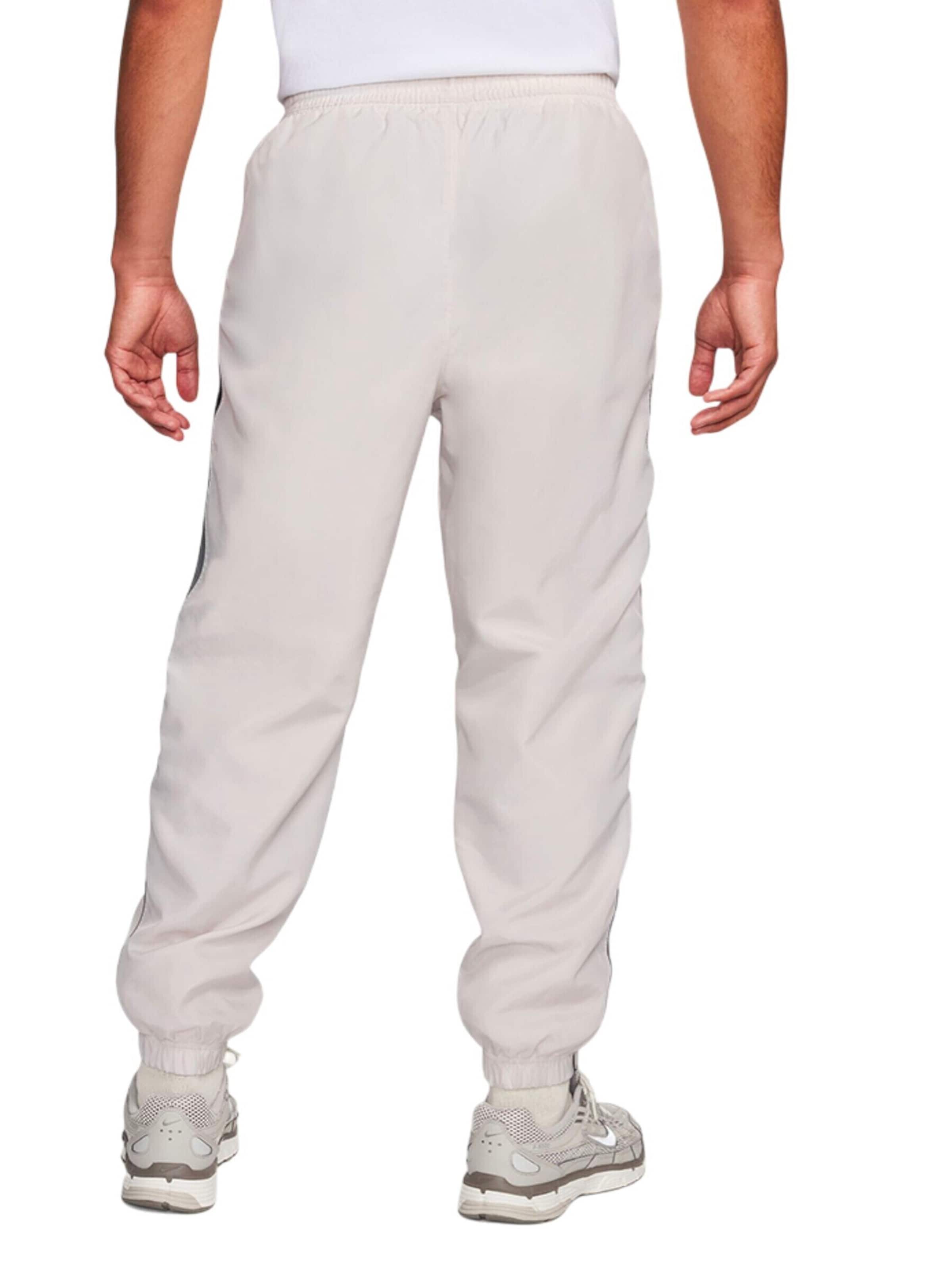 Tapered Pantaloni 'Air' di Nike Sportswear in grigio