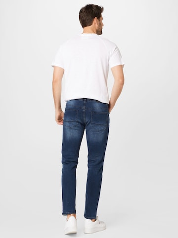 Coupe slim Jean BURTON MENSWEAR LONDON en bleu