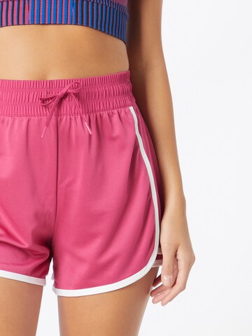 Regular Pantalon de sport Reebok en rose