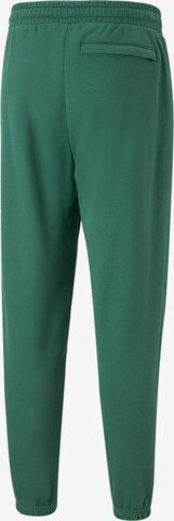 Tapered Pantaloni di PUMA in verde