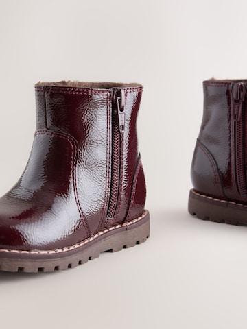 Bottes Next en rouge