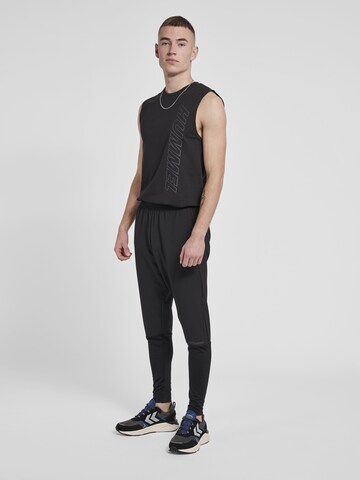 Hummel Tapered Sports trousers in Black