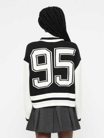 Cardigan Nike Sportswear en noir : devant