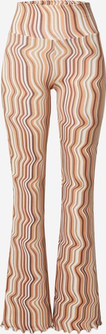 ABOUT YOU x Sofia Tsakiridou Flared Broek 'LOU' in Beige: voorkant