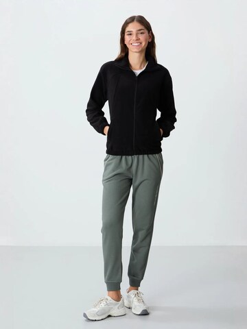 Tommy Life Bluzka sportowa w kolorze czarny