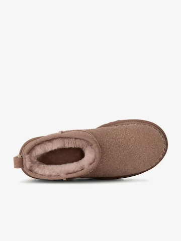 UGG - Botas 'Classic Ultra Mini' em bege