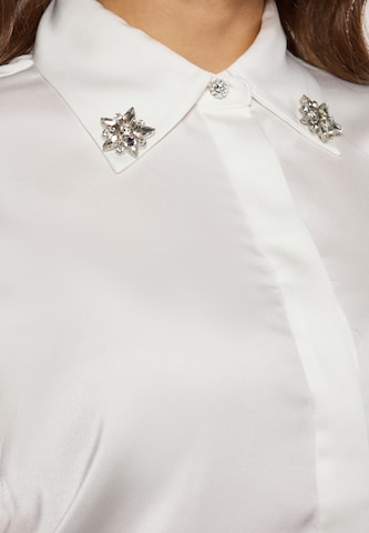 Camicia da donna di faina in bianco