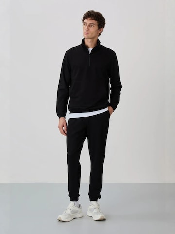 Tommy Life Joggingpak in Zwart