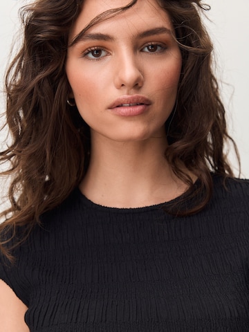 T-shirt Next en noir