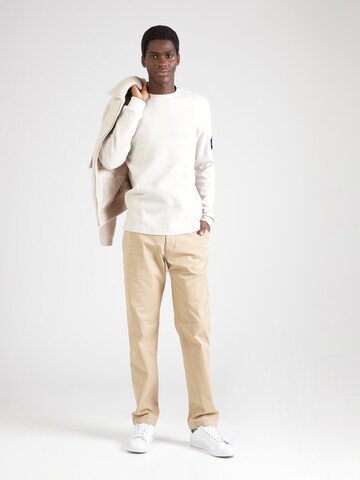Calvin Klein Jeans Конический (Tapered) Брюки-чинос в Бежевый