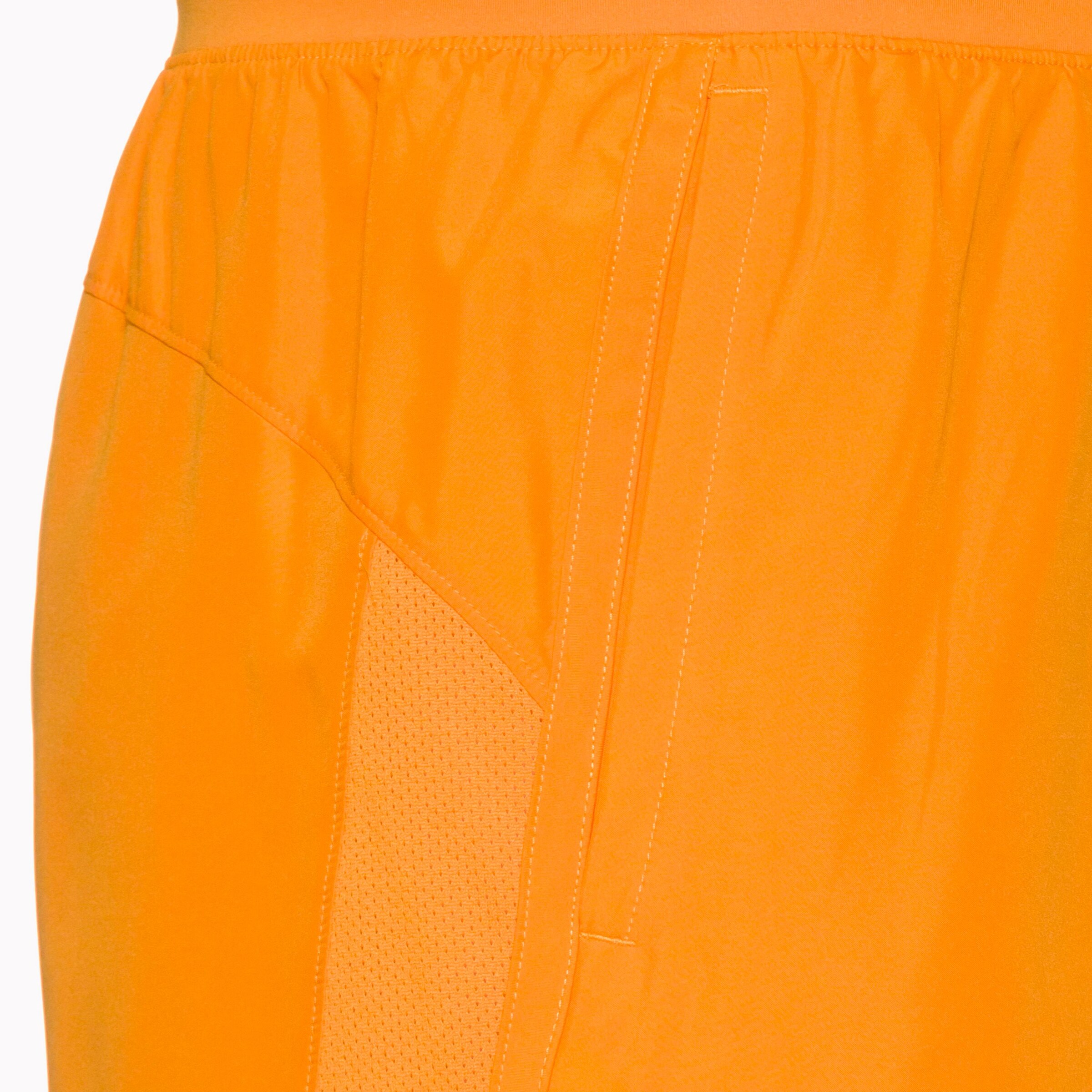 UNDER ARMOUR Regular Sportbroek 'Launch 7' in Oranje