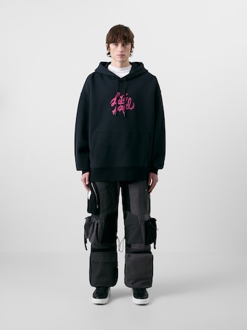 KARL LAGERFELD JEANS - Sweatshirt 'KLJ X ATELIER' em preto: frente