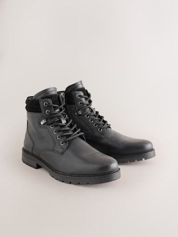 Next - Botas con cordones en negro