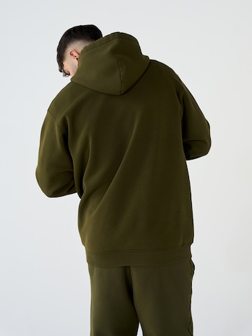 Sweat-shirt 'Elia' ABOUT YOU x Dardan en vert