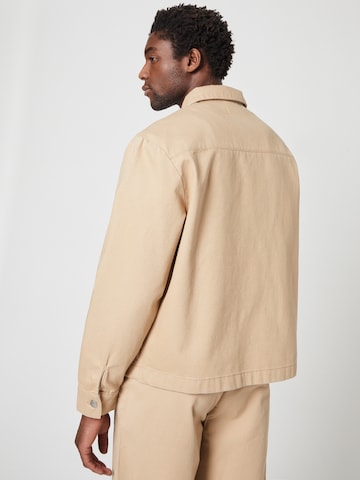 ABOUT YOU x Louis Darcis Between-Season Jacket in Beige