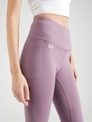 UNDER ARMOUR Skinny Urheiluhousut 'Motion' värissä lila