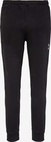 Tapered Pantaloni sportivi di Hummel in nero
