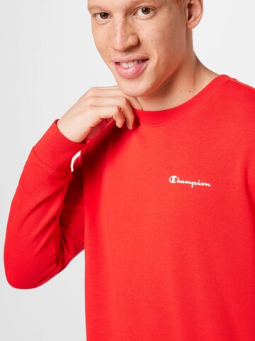 Champion Authentic Athletic Apparel Sweatshirt in Red