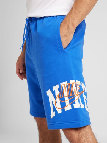Nike Sportswear Loosefit Kalhoty 'CLUB' – modrá