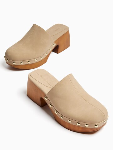 Bershka Clogs in Beige