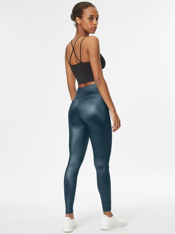 NIKE Skinny Sporthose in Grün