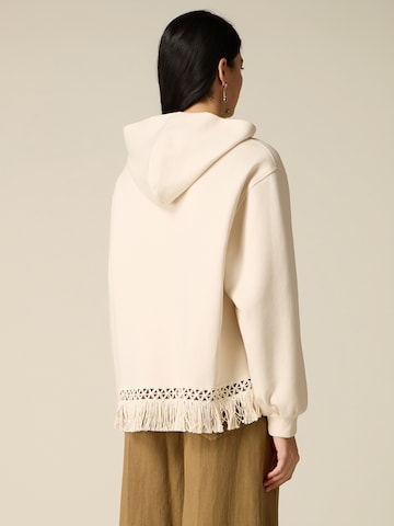 Pullover di oltre in beige