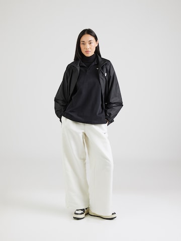 Nike Sportswear Wide Leg Housut 'Windrunner' värissä valkoinen