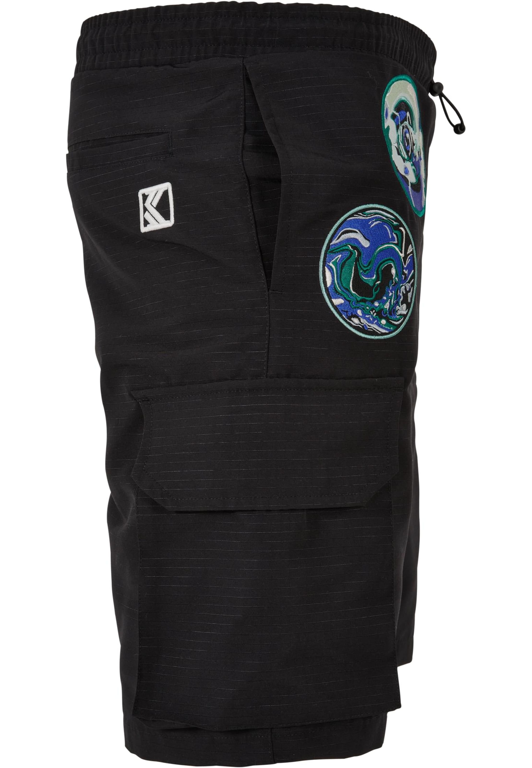 regular Pantaloni di Karl Kani in nero