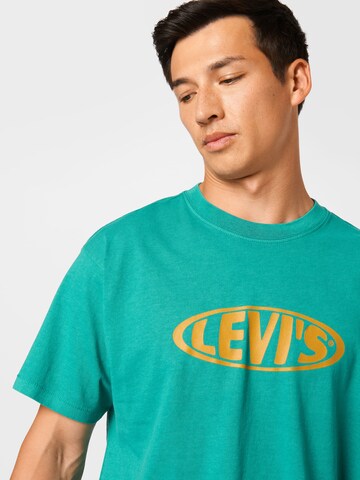 LEVI'S ® Póló 'Vintage Fit Graphic Tee' - zöld