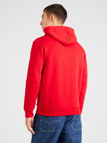 Champion Authentic Athletic Apparel Sweatshirt i röd