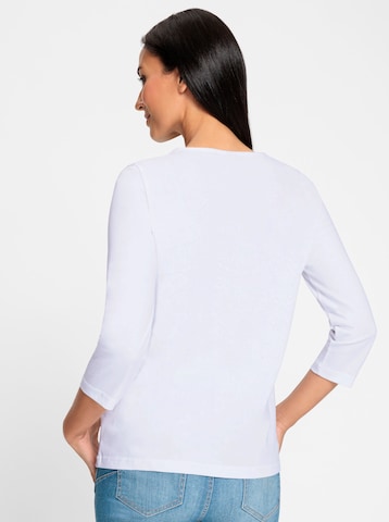 Tricou de la heine pe alb